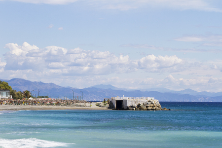 Promontory over a blue sea, horizontal imageの写真素材