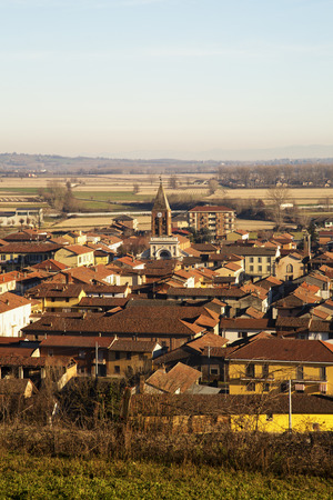 Town view under blue sky, vertical imageの写真素材