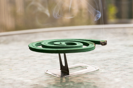 Fumigator over glass table, close up, horizontal imageの写真素材