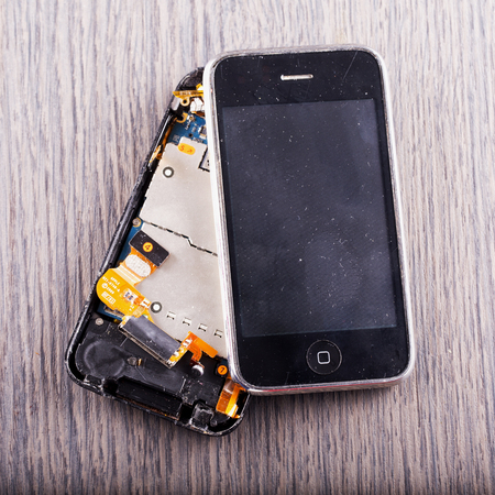 MAY 6, 2018 - Crashed Apple iPhone 3GS. iPhone is the best known smartphone brand in the worldのeditorial素材
