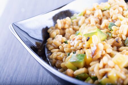 Rice with shrimps and zucchini, close up, horizontal imageの写真素材