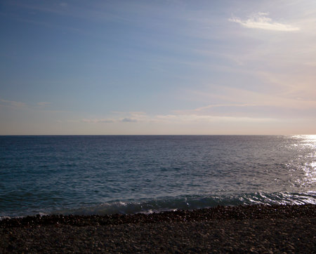 View of sea waves under sunset light, landscape viewの写真素材