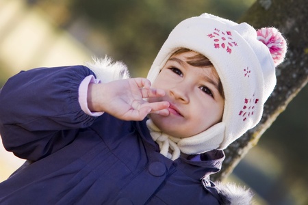 Little girl and autumn