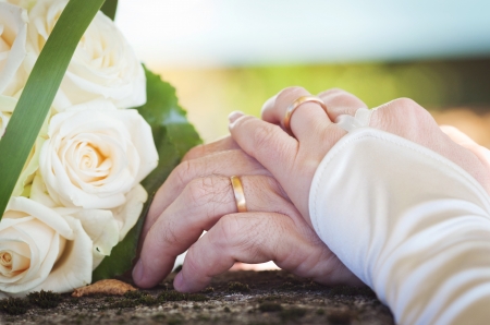 Wedding rings and bouquetの写真素材