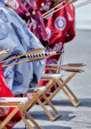 Traditional kimono with wooden sticks on the beach in Japan.の写真素材