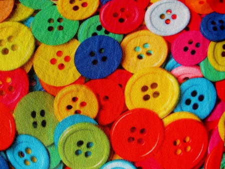 Fragment of sewing buttons colorful pattern fabricの写真素材