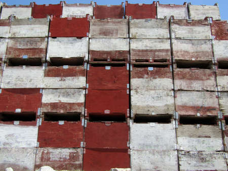 Wooden boxes stacked one on top of the other.