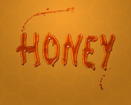 word honey on subtle honeycomb backgroundの写真素材