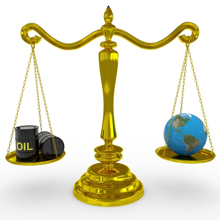 Oil barrel and earth globe on a scales. Computer generated image.の写真素材
