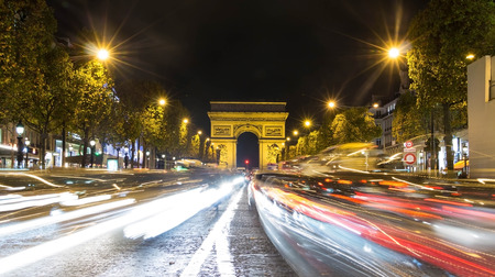 Paris, France, November 5, 2015: The high trafficblur motion Champs-Elysees avenue is in Paris, France, November 5, 2015.のeditorial素材
