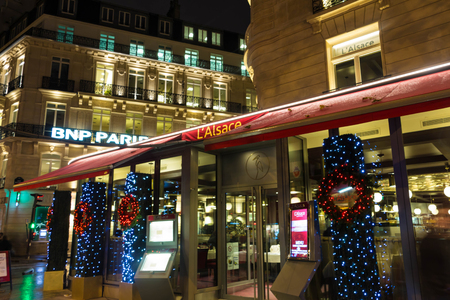Paris, France-November 13; 2015: The restaurant Alsace is located along the Champs Elysees avenue in Paris.It is the meeting point of shopaholics, artists and night owls.のeditorial素材