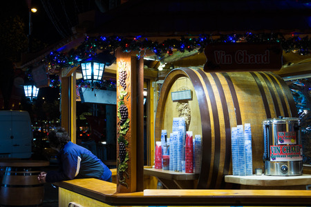 Paris, France- November 13, 2015: The booth of mulled wine on Chistmas market located along Champs Elysees avenue in Paris, France.のeditorial素材