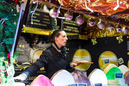 Paris, France-November 22, 2015: The unidentified confectioner of Provence sweets at Christmas market located on Champs Elysees avenue in Paris, France.のeditorial素材