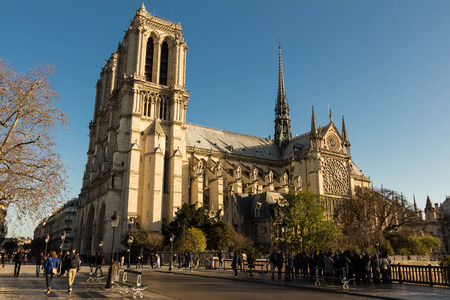 Paris, France-November 28, 2015: The cathedral Notre Dame is a historic Catholic cathedral on the easern half of the Ile de la Cite in the 4th arrondissement of Paris, France.It is the largest and most well known church building in the world.のeditorial素材