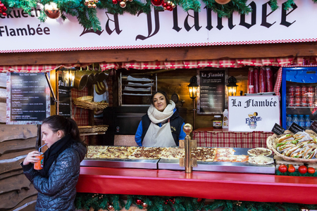 Paris; France-November 28; 2015: The unidentified baker at Christmas market on Champs Elysees avenue in Paris, France.のeditorial素材
