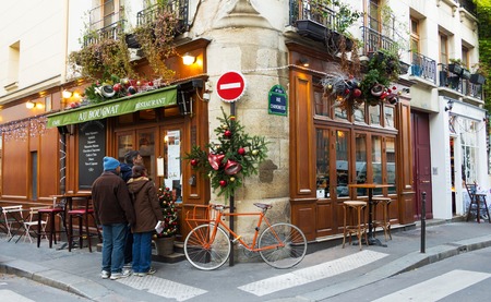 Paris, France-September 10, 2016: the traditional French cafe Au Bougnat set in a rustic bistro style, located near Notre Dame cathedral, on the isle de la Cite, in the 4th district of Paris.のeditorial素材