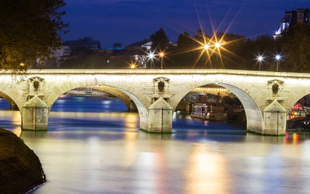 TheMarie Bridge at night, Paris, France.の写真素材