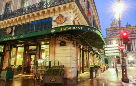 Paris, France-May 08, 2017: The famous cafe de la Paix located near opera house -Garnier palace in Paris, France. It had been inaugurated on May 5th , 1862.のeditorial素材