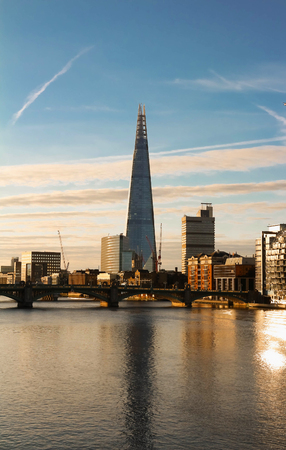 The view of Shard building, skyscrapers and Thames River at sunset, London, United Kingdom.のeditorial素材