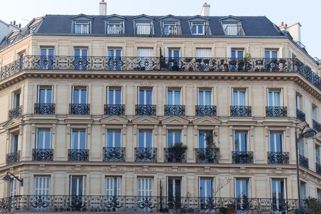 The traditional facade of Parisian building, France.