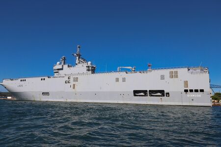 The amphibious assault helicopter carrier Dixmude docked in the French Navy base at the harbor of Toulon, France.のeditorial素材