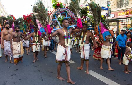 The devotees celebrating the Ganesha hindu festival- Ganesh Chaturthi in the streets of Paris.のeditorial素材