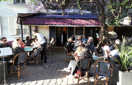 The traditional French restaurant Chez Plumeau in Montmartre in 18 district of Paris, France.のeditorial素材