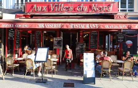 The typical Parisian cafe Aux villes du Nord located near Gare du Nord in Paris, France.のeditorial素材