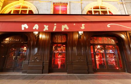 The facade of famous restaurant Maxim at night, Paris, France.のeditorial素材