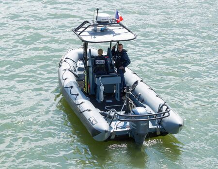 The river shuttle of the French National Police which carries out surveillance on the Seine river. Paris. France.のeditorial素材