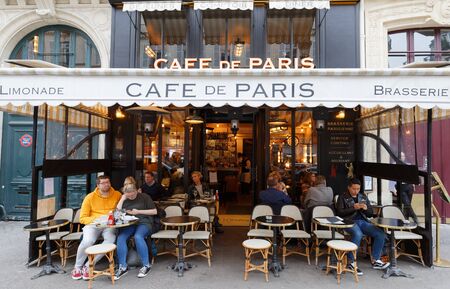 Cafe de Paris is traditional French cafe located in historical centre of Paris, near the Louvre museum.のeditorial素材