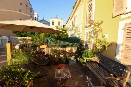 View of the South Sea City - courtyard, parasol, plants,Mediterranean architectureの写真素材