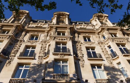 Traditional French house with typical balconies and windows. Paris.の写真素材