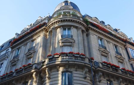 Traditional French house with typical balconies and windows. Paris.の写真素材