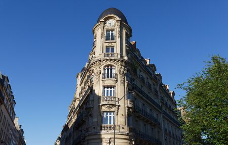 Traditional French house with typical balconies and windows. Paris.の写真素材