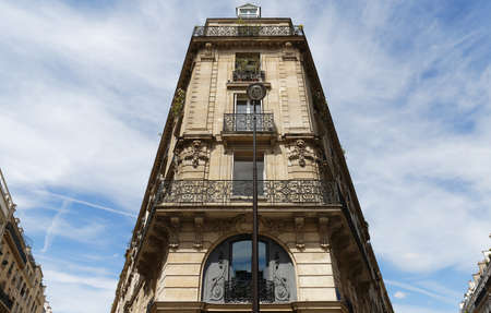 Traditional French house with typical balconies and windows. Paris.の写真素材