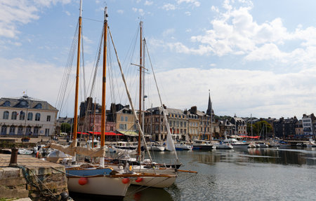 Honfleur harbour in Normandy, France. Color houses and their reflection in water.の写真素材
