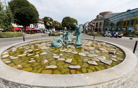 The mussel gatherers statue in centre of medieval fishing village of Honfleur, Normandie region, France .のeditorial素材