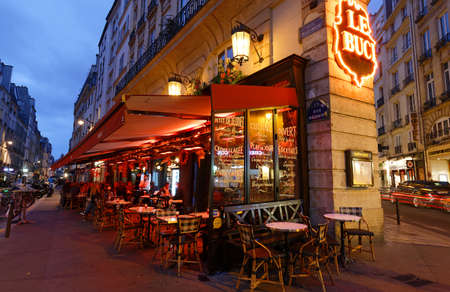 The traditional French cafe Buci at night . It located in Saint German district in Paris.のeditorial素材