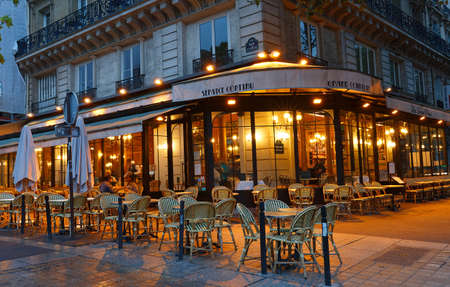 The traditional French cafe "Deux Palais" at night . It located near Palace of Justice in Paris.のeditorial素材