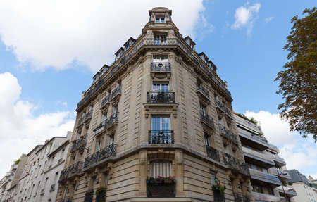 Traditional French house with typical balconies and windows. Paris.の写真素材