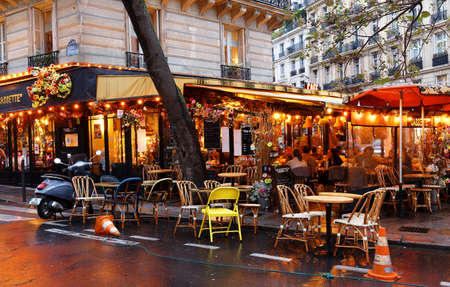 The traditional French cafe Cassette decorated with flowers . It located in Saint Germain district in Paris.のeditorial素材