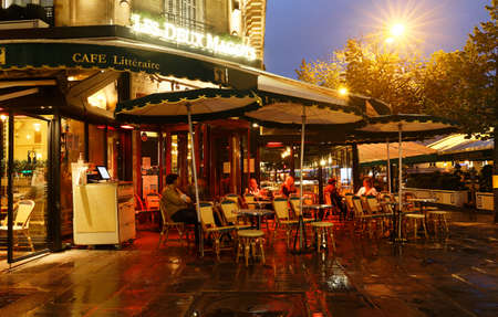 The famous cafe Les deux magots located on Saint-Germain boulevard .It was once home for to intellectual stars , from Hemingway to Picasso.のeditorial素材
