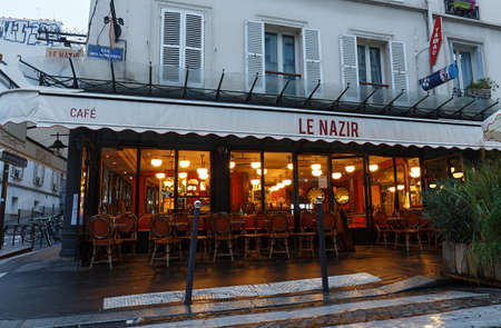 Le Nazir at rainy morning . It is a traditional French restaurant in the middle of Montmartre district, Paris, France.のeditorial素材