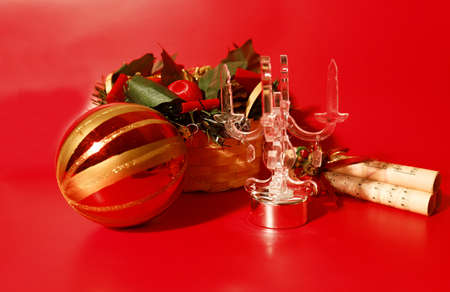 Christmas home decor with candlestick, Christmas bauble, parchment and basket.の写真素材
