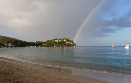 Rainbow on Anse Mitan Bay - Les Trois Ilets - Martinique .の写真素材