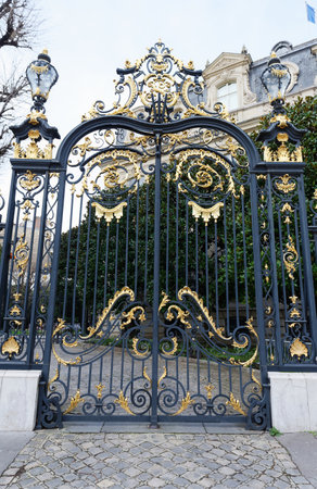 Black and golden gate of Marcel Dassault building hosts Artcurial auction house in Paris, Franceのeditorial素材