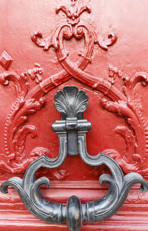European Vintage old metal wrought iron door knocker. Design detail. Paris.の写真素材