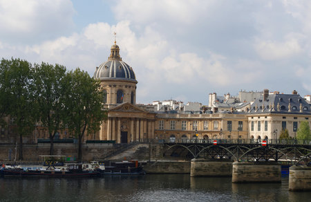 The view of French Academy and Arts bridge at night , Paris, France.の写真素材
