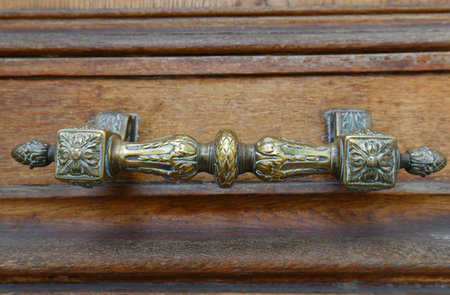 European Vintage old metal wrought iron door knocker. Design detail. Paris.の写真素材